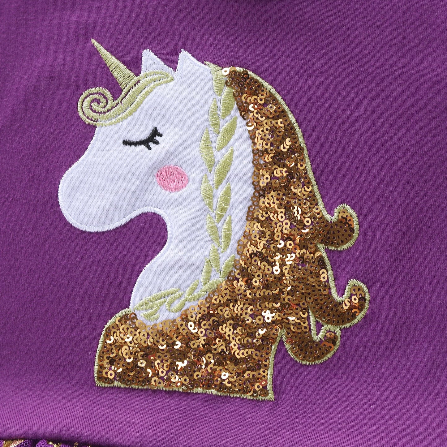 Unicorn design in purple dress